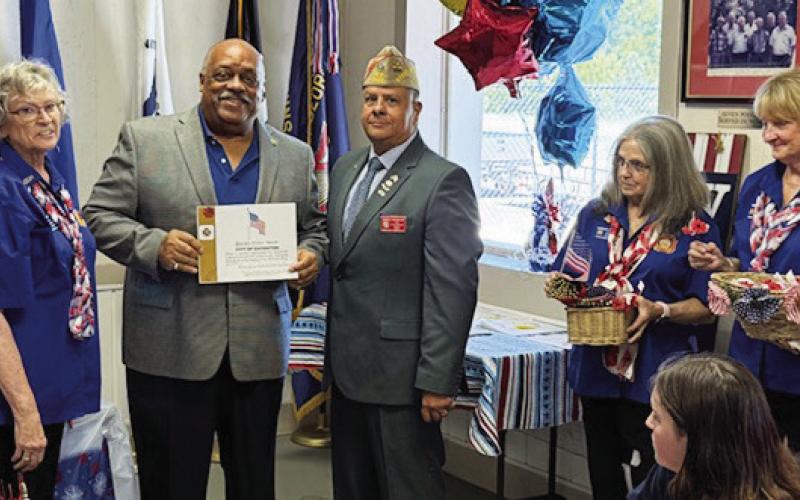 Eatonton Mayor John Reid (holding certificate) was among the visiting dignitaries last Saturday at VFW Post 6686. CONTRIBUTED