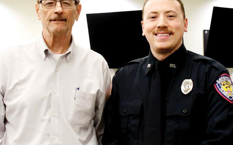 Early this month at a scheduled Eatonton City Council meeting, Eatonton Police Chief Howell Cardwell (left) introduced Officer Mitch Jimenez to council members as his latest addition to the force. Jimenez told council members he’s enjoying the job here and looks forward to helping others and getting involved locally. IAN TOCHER/Staff