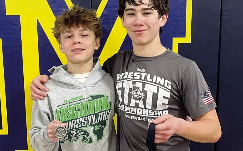 Gatewood freshmen Luca Ciaccio (left) and Hunter Pierce (right) pose for a photo with their medals at a tournament earlier this season. CONTRIBUTED