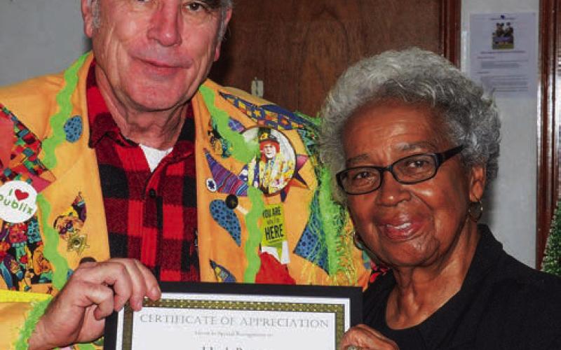 Hank Bauer received his award for approaching his job with humor and grace under pressure. IAN TOCHER/Staff