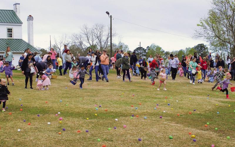 And they’re off! About 200 kids raced down the hill of the Uncle Remus Golf Course with a competitive spirit to guide them to grab each and every egg. IAN TOCHER/Staff