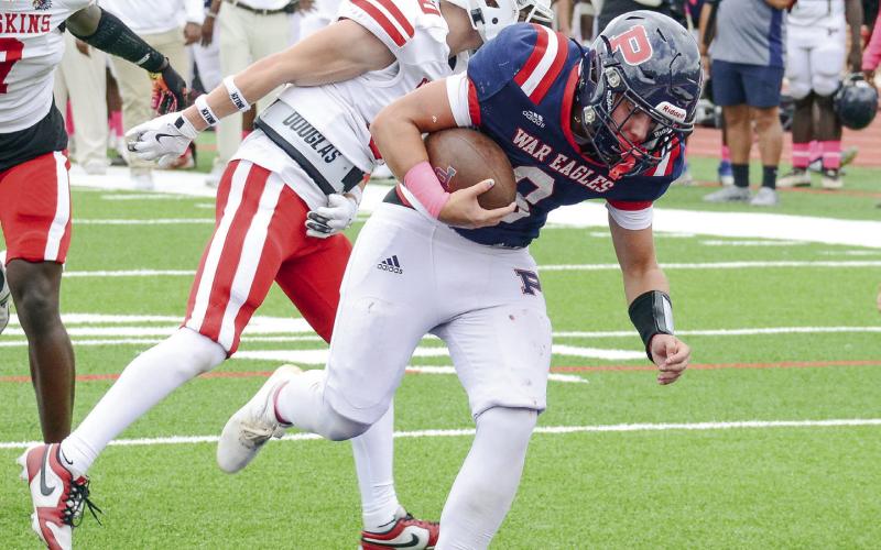 War Eagles quarterback Branan Griffin scored with a short carry early in the fourth quarter. IAN TOCHER/Staff