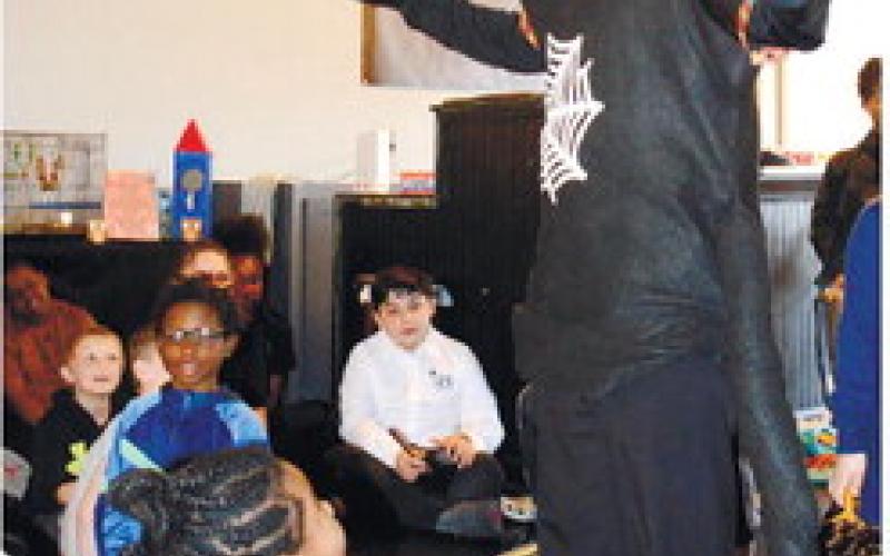 Jerry G. White, author of Anansi and the colorful kente cloth, gave a spirited, interactive performance while dressed as his title character.