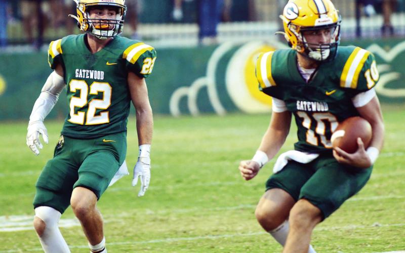 Gatewood senior Hunter Johnson (22) had a career night at Mount de Sales last Friday, rushing for 325 yards and scoring five touchdowns in a 46-20 win for the Gators. Meanwhile, quarterback Ames Johnson (10) had 12 carries for 96 yards and threw a touchdown pass to junior wide receiver Ben Brannen. FILE PHOTO