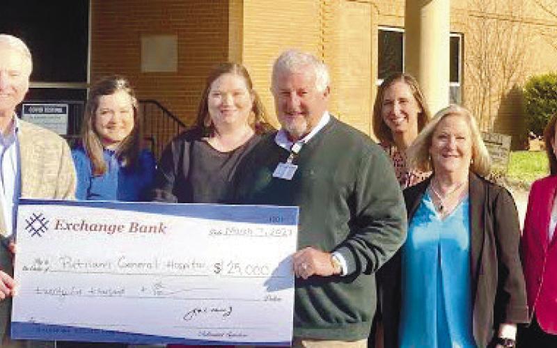 Representatives of the Exchange Bank delivered a $25,000 donation made through the Georgia HEART program earlier this year to Putnam General Hospital CEO Alan Horton (center). CONTRIBUTED