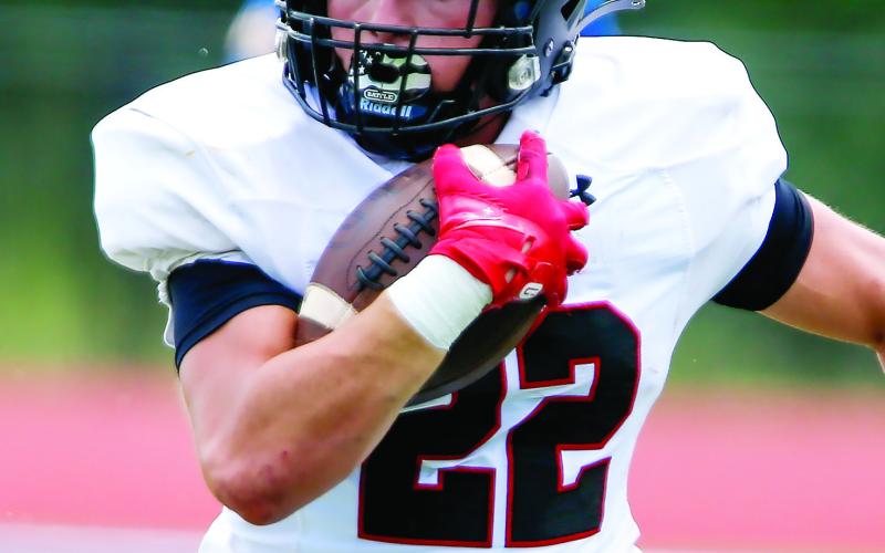 With Christian Monfort graduated, senior Alex Corrias is ready to step into a bigger role at running back and help fill the void left by the former starter. LANCE McCURLEY/Staff