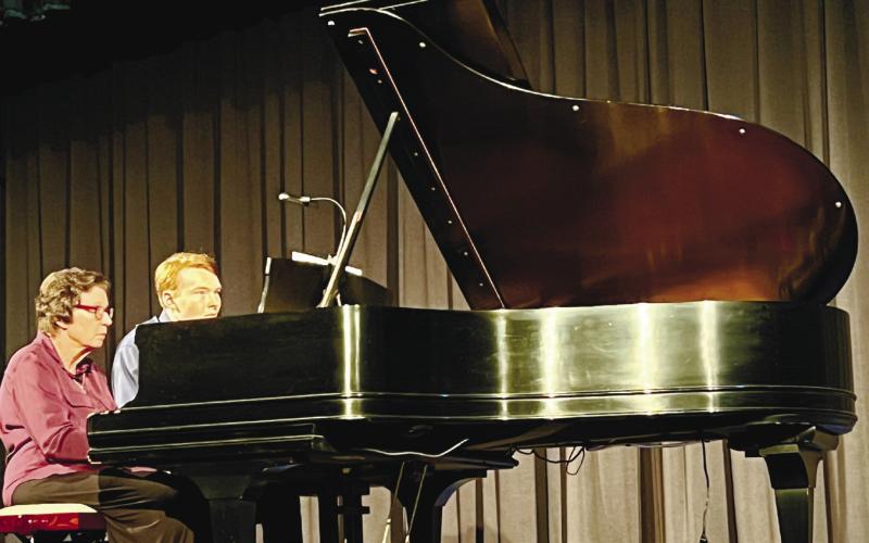 Festival Hall unveiled its new Steinway piano during a Piano and Art Celebration July 19. CONTRIBUTED