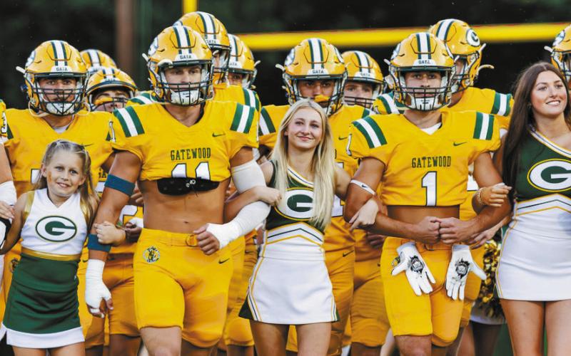 Coach Jeff Ratliff explained his team wore special “Gold Out” uniforms on Friday night in honor of fighting pediatric cancer. Prior to the game, his players walked out three Gatewood students who have beaten childhood cancer and donations were collected from spectators to support the cause. CONTRIBUTED