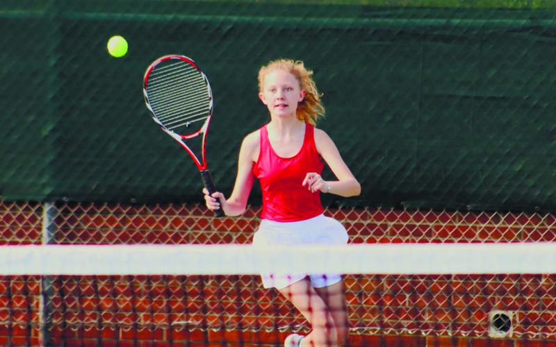 Alongside doubles teammate Caroline Thomas, Abigail Hildreth (shown) picked up her first set win March 16, in Augusta. ARELLA CASH/Staff