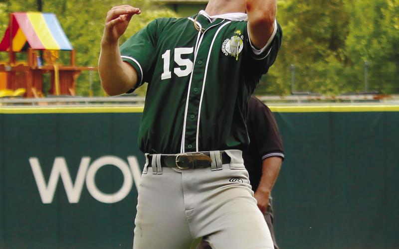 Lawson Wooten (15) hauls in a pop-fly.