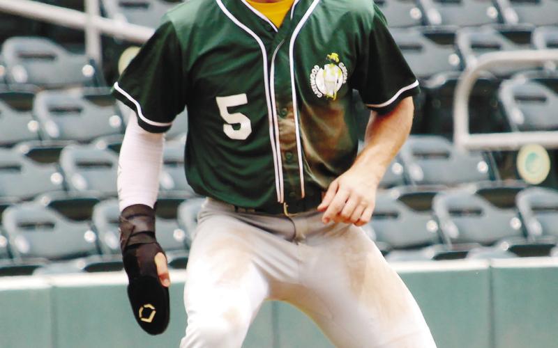 Caleb Riser (5) looks to advance to another base.