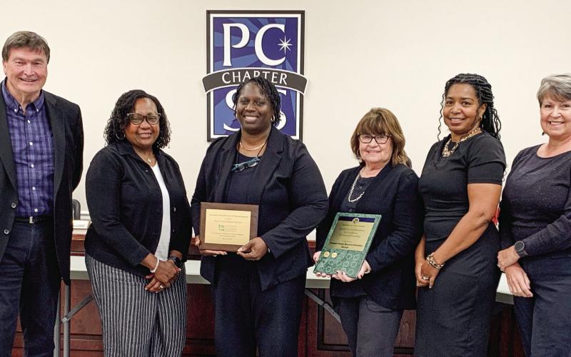 The finance department of the Putnam County Charter School System were awarded by the Association of School Business Officials International and Government Finance Officers Association. BAILEY McCULLY/Staff