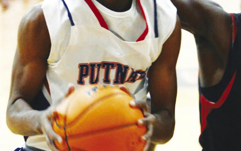 Putnam County’s Shamar McClendon (12) contributed 11 points to the War Eagles victory. IAN TOCHER/Staff