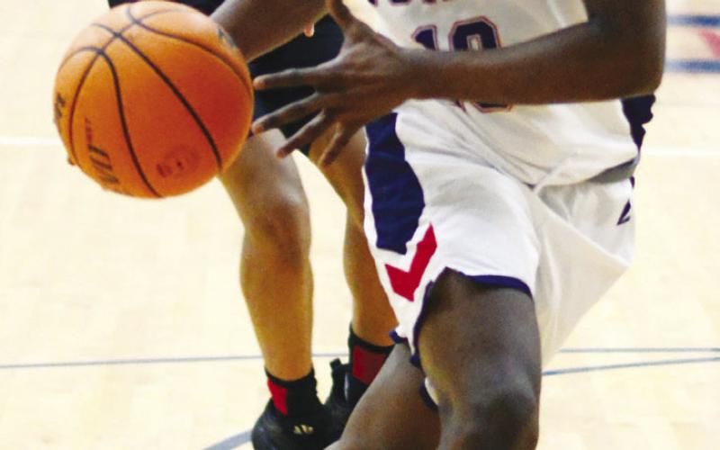 Putnam County junior guard Tamaud Woodson scored a team-high 18 points against Jasper County on Dec. 21. IAN TOCHER/Staff