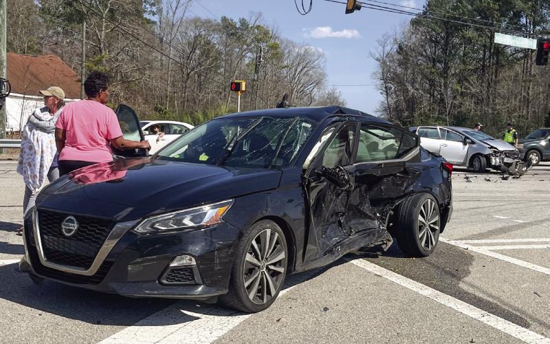 A driver who ran a red light at the intersection of Pea Ridge Road, Twin Bridges Road and U.S. Hwy. 441 crashed into this car. Air bags apparently saved the car’s occupants from being seriously injured. MATT SMITH/Staff