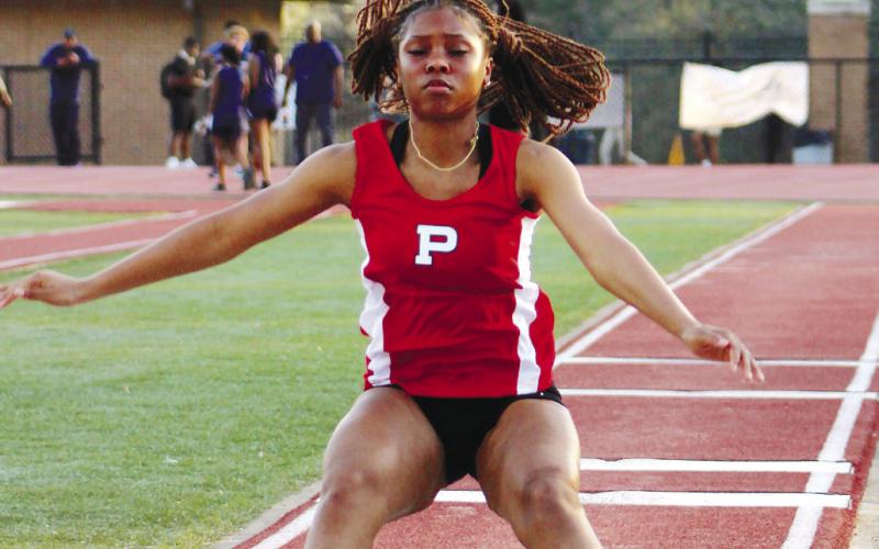 Halana Griffin performs a long jump. ARELLA CASH/Staff