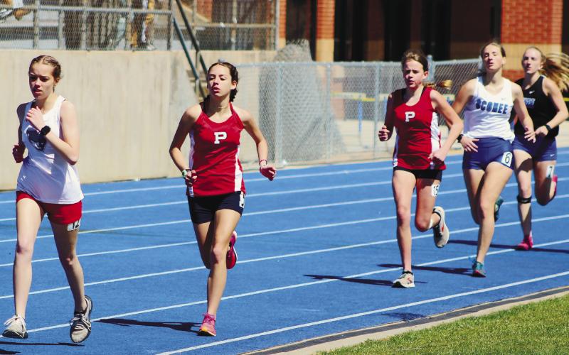 PCHS girls (in red) performed well on the track. ARELLA CASH/Staff