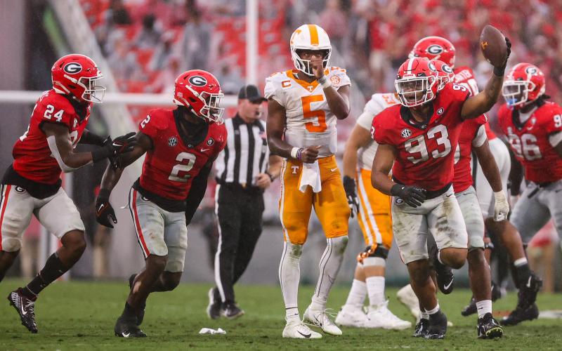 Georgia defensive lineman Tyrion Ingram-Dawkins (93) celebrates after picking up a fumble against Tennessee.