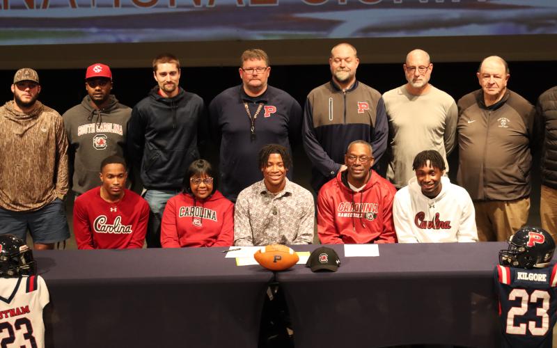 Kilgore after signing his letter of intent with his family and his coaches. BRENDAN KOERNER/Staff