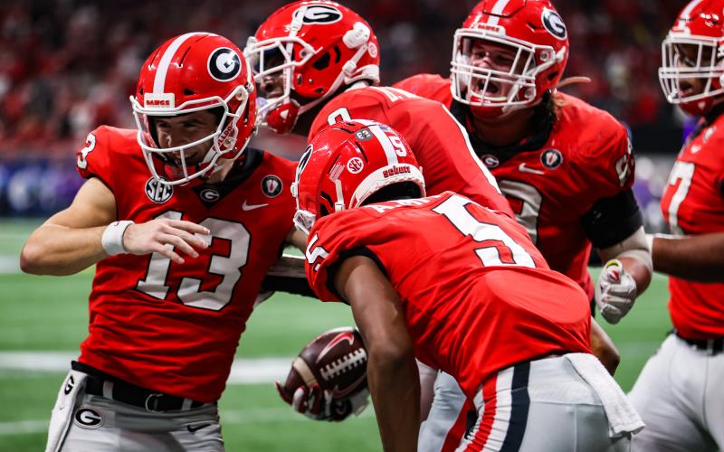 Georgia tight end Darnell Washington (0), Georgia quarterback Stetson Bennett (13), Georgia wide receiver Adonai Mitchell (5) during the 2022 SEC Championship Game at Mercedes-Benz Stadium in Atlanta, Ga., on Saturday, Dec. 3, 2022. (Photo by Kayla Renie)
