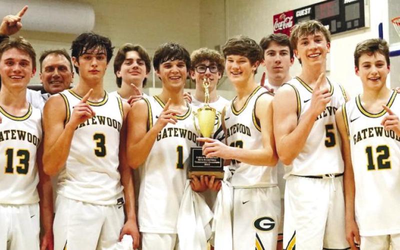The Gatewood Gators were all smiles after capturing the GIAA Class AA District 2/4 championship. BOB BETZEL/Contributed
