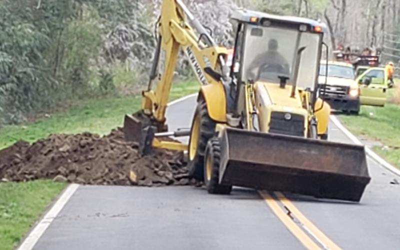 Workers repair a gas line break in Imperial Mill Road in Eatonton. Photo contributed by Fire Chief Hubert