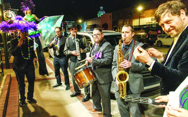 In true New Orleans style, Bogey and the Viceroy paraded guests around the building at Barrel 118.
