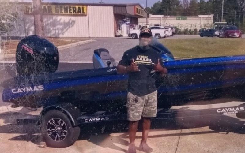 Williams and his boat. (CONTRIBUTED)