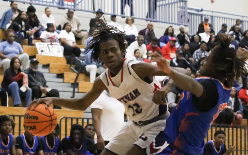 Shamar McClendon (12) plays a physical game for the War Eagles and contributed a double-double with 14 points and 10 boards in a 72-63 win over Commerce in  Class A Division I playoff action. TREY NORRIS/Staff
