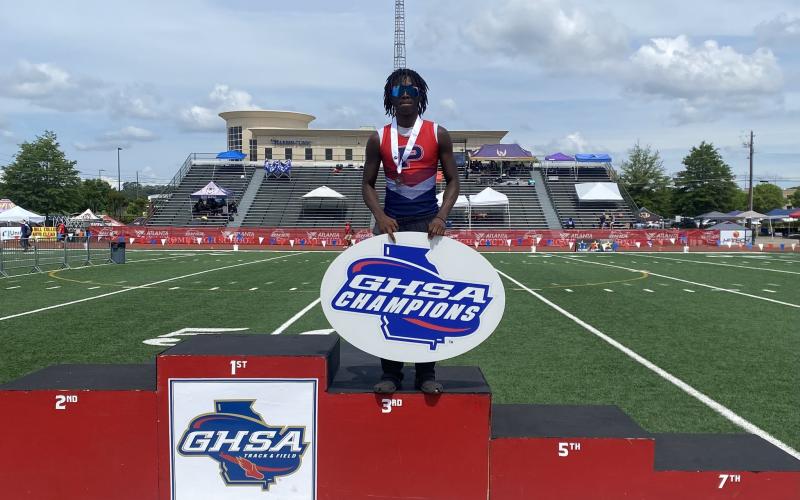 Putnam County junior Bill Waters sets placed third in the high jump at the Class A Division I state meet. CONTRIBUTED