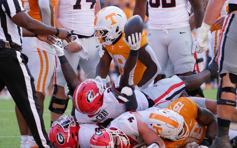 Georgia running back Josh McCray celebrates after scoring a touchdown in the third quarter against Tennessee. LANCE McCURLEY/Staff
