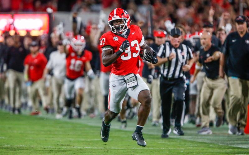 Georgia running back Chauncey Bowens rushes for a career-high 43-yard gain in the second quarter of last week’s game against Alabama. LANCE McCURLEY/Staff