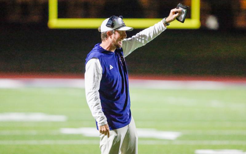 Putnam County head coach Joel Harvin instructs his players from the sideline during a game against Lamar County on Oct. 17. LANCE McCURLEY/Staff