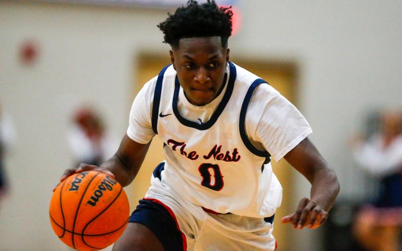 Putnam County senior Tamaud Woodson scored a team-high 32 points in the team's win over BEST Academy in the first round of the state playoffs. LANCE MCCURLEY/Staff