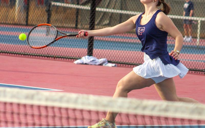 Putnam County's Addie Grace Usry returns a serve during a match earlier this season. KIM CASH/Contributed