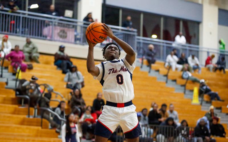 Putnam County senior guard Tamaud Woodson (0) scored a team-high 26 points in the War Eagles' second-round win over Dublin.  LANCE MCCURLEY/Staff