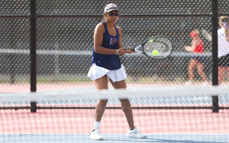 Putnam County No. 2 singles player Vidhi Raiyani returns a serve during a match against Social Circle. LANCE McCURLEY/Staff