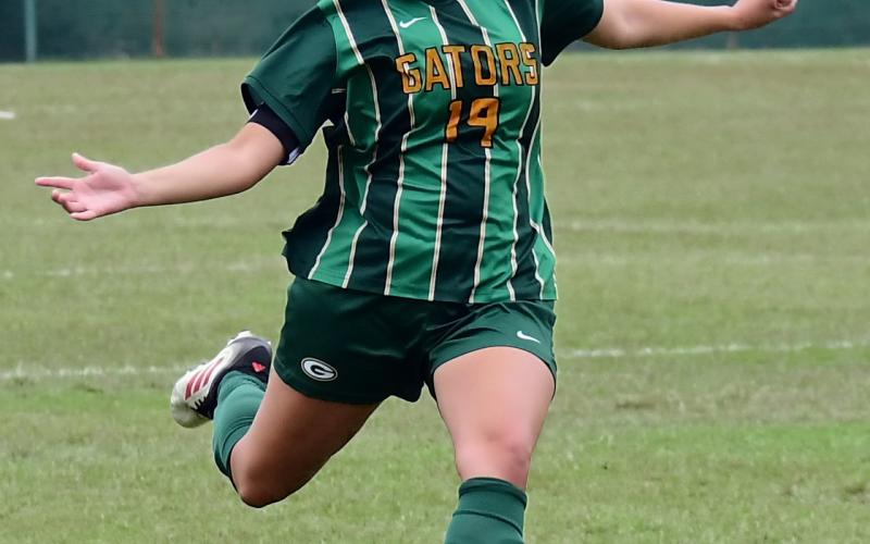 Gatewood senior Kimberly Mendez set the tone early for the Gators on Friday night, scoring a natural hat trick in the first half against First Preparatory Academy. IAN TOCHER/Staff