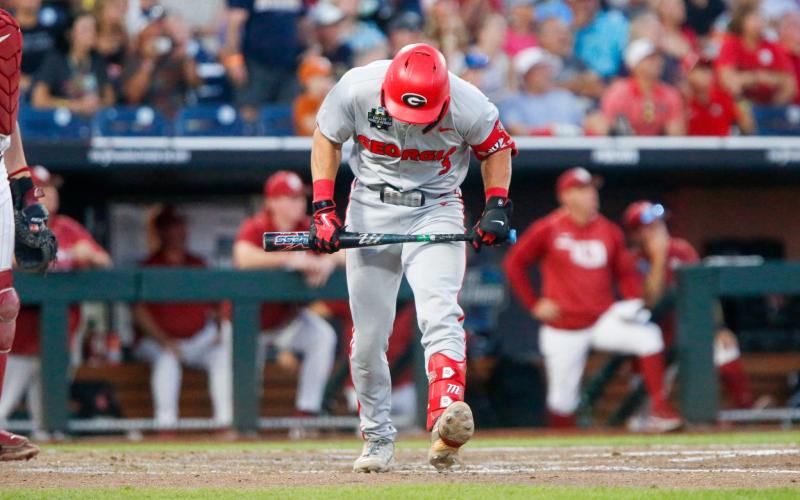 Georgia catcher Daniel Jackson stood in disbelief as he walked out of the batter’s box after flying out for the final out of the Bulldogs’ 4-3 loss to Oklahoma. LANCE McCURLEY/Staff