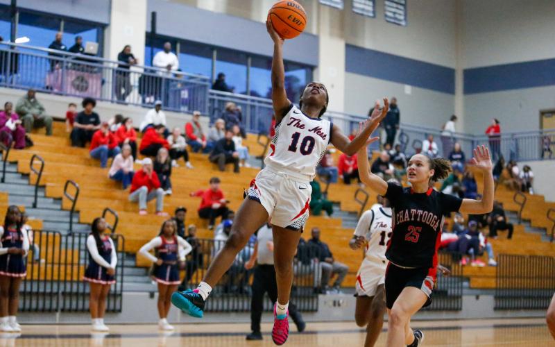 Journey Waller (10) goes up for a layup during a playoff game against Chattooga on Feb. 25. LANCE McCURLEY/Staff