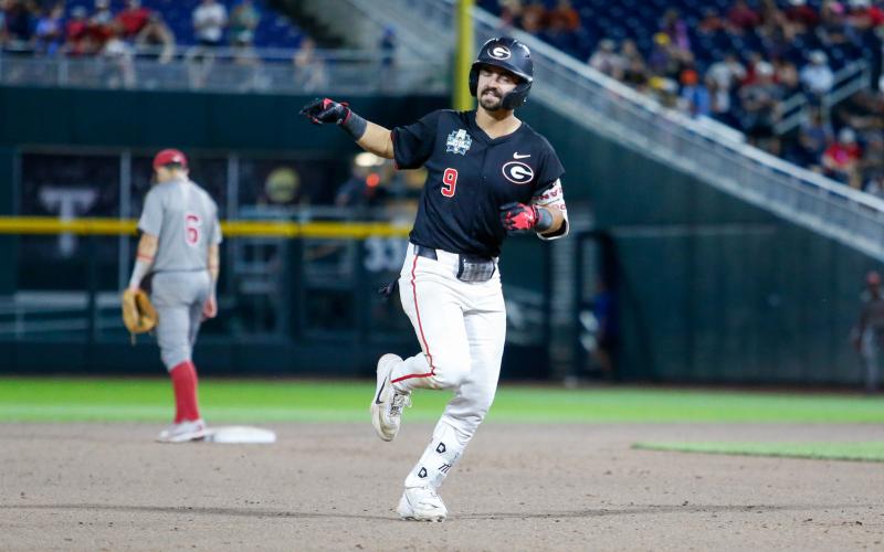 Georgia shortstop Kolby Branch rounds the bases after hitting a home run in the final at-bat of his Bulldog career. LANCE McCURLEY/Staff