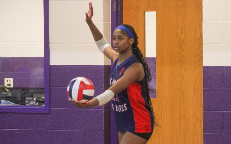Freshman Avery Abrams prepares to serve for the War Eagles. BRAD HARRISON/Staff