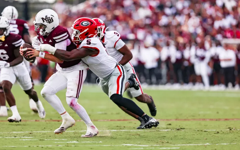 Georgia inside linebacker Raylen Wilson (5) tackles Mississippi State quarterback Blake Shapen during a game in Starkville last season. LANCE McCURLEY/Staff