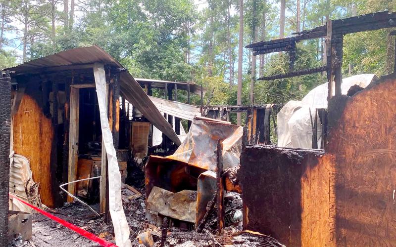 The mobile home on Sunset Drive is totally destroyed after a fire. The family’s pets perished in the fire. (Contributed photo)