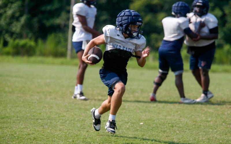 Putnam County freshman receiver Elijah Kelly runs downfield during a practice last week. LANCE McCURLEY/Staff