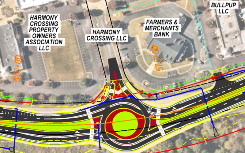 The new traffic signal at Lake Oconee Parkway and Harmony Crossing will give way to a roundabout when the widening project reaches its conclusion.