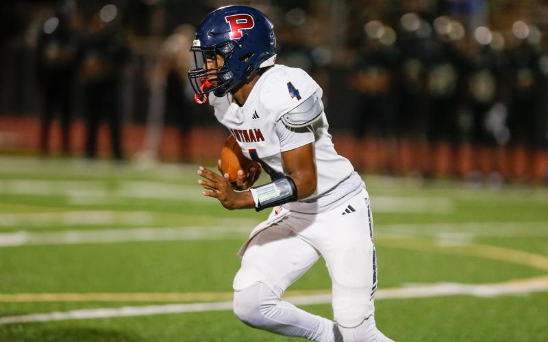 Putnam County junior quarterback Caleb Reeves had a big night for the War Eagles in their Aug. 28 win over Hancock Central. LANCE MCCURLEY/Staff