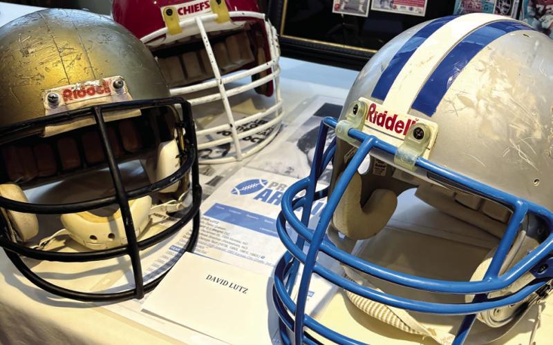 David Lutz’s football helmets on display at the reception.