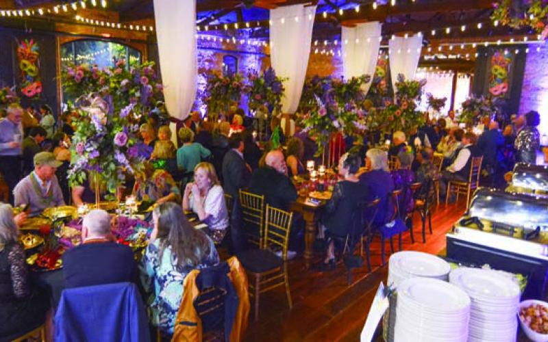 Barrel 118 was decked out with a distinct New Orleans vibe for the 5th annual ArtiGras Carnival, a Mardi Gras-themed fundraiser for the arts in Eatonton. IAN TOCHER/Staff