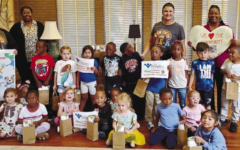 L to R: Brandi Lyles, Candice Ellinson, Anna Watkins and Kim Ruff enjoyed their Pre-K visit to The Peoples Bank in Eatonton, where each student received a goodie bag from bank staff. CONTRIBUTED